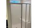 This is a shower with a white tiled wall and shower bench at 9140 Dupree Meadow Dr # 9, Angier, NC 27501