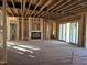 Open living area featuring a fireplace and large sliding doors at 1317 Old Lystra Rd, Chapel Hill, NC 27517
