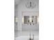 Spa-like bathroom with double vanity and large mirrors at 5312 Alpine Dr, Raleigh, NC 27609