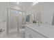 Bathroom with a glass shower, vanity with sink, and modern tiling at 820 Willow Tower Ct # 153, Rolesville, NC 27571