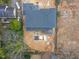 Aerial view of a new home under construction, showing the foundation, framing, and surrounding landscape in a residential area at 4123 Rockingham Dr, Raleigh, NC 27609