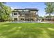Expansive backyard featuring a stunning in-ground pool and multi-level deck, perfect for outdoor entertaining at 4123 Rockingham Dr, Raleigh, NC 27609