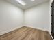 Finished basement featuring hardwood floors and recessed lighting at 4123 Rockingham Dr, Raleigh, NC 27609