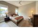 A tranquil bedroom featuring a plush bed, soft lighting, and neutral color palette at 4123 Rockingham Dr, Raleigh, NC 27609