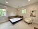 Bright bedroom with a built-in bed frame, neutral decor, and a relaxing atmosphere at 4123 Rockingham Dr, Raleigh, NC 27609