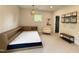 Bright bedroom with patterned wallpaper, carpet and built-in shelving above the bed frame at 4123 Rockingham Dr, Raleigh, NC 27609