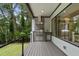 Outdoor kitchen area featuring a built-in grill and view of the backyard at 4123 Rockingham Dr, Raleigh, NC 27609