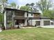 Beautiful two-story home with a two-car garage, manicured lawn, and attractive modern design at 4123 Rockingham Dr, Raleigh, NC 27609