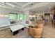 Bright living room with modern decor, comfortable seating, and seamless transition to other living spaces at 4123 Rockingham Dr, Raleigh, NC 27609