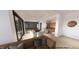 Open-concept living space with a dining area, pool table, and modern decor, offering a perfect blend of entertainment and relaxation at 4123 Rockingham Dr, Raleigh, NC 27609