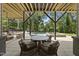 Inviting outdoor patio with ample seating, a pool, and spa, perfect for entertaining at 4123 Rockingham Dr, Raleigh, NC 27609
