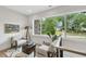Bright sitting area featuring large windows and contemporary decor at 4123 Rockingham Dr, Raleigh, NC 27609