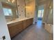 Spacious bathroom featuring double sinks, modern fixtures, and ample counter space at 165 Inspiration Way, Fuquay Varina, NC 27526