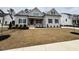 Charming single-Gathering home with manicured lawn and inviting front porch at 165 Inspiration Way, Fuquay Varina, NC 27526