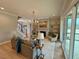 Inviting living room with stone fireplace, open layout, and plenty of natural light at 165 Inspiration Way, Fuquay Varina, NC 27526