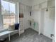 Bright walk-in closet offers an abundance of storage space with built-in shelving at 165 Inspiration Way, Fuquay Varina, NC 27526