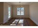 Breakfast nook with chandelier and access to backyard at 183 Inspiration Way, Fuquay Varina, NC 27526
