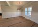 Bright dining room with wainscoting and chandelier at 183 Inspiration Way, Fuquay Varina, NC 27526