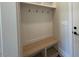 Inviting entryway with built-in bench and shelving at 183 Inspiration Way, Fuquay Varina, NC 27526
