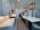 Modern kitchen with stainless steel appliances and white cabinets at 183 Inspiration Way, Fuquay Varina, NC 27526