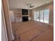 Spacious living room with fireplace and access to outdoor space at 183 Inspiration Way, Fuquay Varina, NC 27526