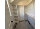 Bright walk-in closet with shelving at 183 Inspiration Way, Fuquay Varina, NC 27526