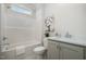 Clean bathroom with a bathtub, toilet and vanity with a quartz countertop at 35 Uptown Rd, Zebulon, NC 27597