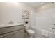 Bathroom features a single vanity, quartz countertop, and a tub/shower at 35 Uptown Rd, Zebulon, NC 27597