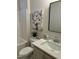 Bathroom with single vanity, quartz countertop, and a tub/shower combo at 35 Uptown Rd, Zebulon, NC 27597