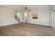 Spacious living room with modern flooring, neutral paint, and a fan at 35 Uptown Rd, Zebulon, NC 27597