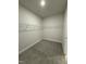 Walk-in closet with carpeted flooring and white wire shelving at 120 Watermelon Dr, Franklinton, NC 27525