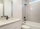 Bright bathroom with subway tile, modern fixtures, and a shower-tub combination at 1535 Urban Trace Ln, Raleigh, NC 27608