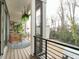 The patio is spacious and has an outdoor hanging plant wall and plenty of seating at 1535 Urban Trace Ln, Raleigh, NC 27608