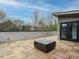 Rooftop deck with a square fire pit, offering a modern outdoor entertaining space at 1535 Urban Trace Ln, Raleigh, NC 27608