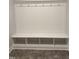 Well-organized mudroom with built-in bench, hooks, and storage cubbies for a tidy entryway at 60 Lemon Drop Ln, Franklinton, NC 27525