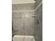 Tiled shower with built in seat, mosaic accent and a chrome shower head at 60 Lemon Drop Ln, Franklinton, NC 27525
