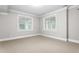 Neutral bedroom with carpet, trim, and bright windows with blinds at 6366 Lineberry Rd, Liberty, NC 27298