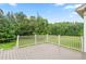Back deck overlooking trees and lawn at 6366 Lineberry Rd, Liberty, NC 27298