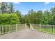 Back deck overlooking trees at 6366 Lineberry Rd, Liberty, NC 27298