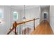 A beautiful foyer is bright and open and looks over the front entry at 6366 Lineberry Rd, Liberty, NC 27298