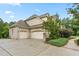 Two-car garage with a spacious driveway and landscaping at 6366 Lineberry Rd, Liberty, NC 27298