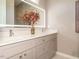 Double vanity bathroom with modern finishes and large mirror at 1531 Urban Trace Ln, Raleigh, NC 27608
