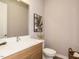 Modern bathroom with quartz countertop and neutral colors at 1531 Urban Trace Ln, Raleigh, NC 27608