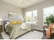 Spacious bedroom with large windows and comfortable seating at 1531 Urban Trace Ln, Raleigh, NC 27608