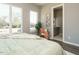 Bright bedroom with large windows and en-suite bathroom at 1531 Urban Trace Ln, Raleigh, NC 27608