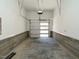 Attached garage with overhead door and ample space at 1531 Urban Trace Ln, Raleigh, NC 27608