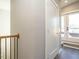 Upper hallway with access to a private deck at 1531 Urban Trace Ln, Raleigh, NC 27608