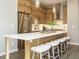 Sleek kitchen with stainless steel appliances and an expansive island at 1531 Urban Trace Ln, Raleigh, NC 27608