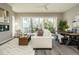 Spacious living area with hardwood floors, a fireplace, and sliding glass doors at 1531 Urban Trace Ln, Raleigh, NC 27608
