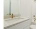 Bathroom with vanity, decorative mirror and gold accents at 1533 Urban Trace Ln, Raleigh, NC 27608